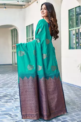 Teal green silk blend banarasi saree with unstitched blouse piece