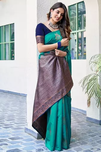 Teal green silk blend banarasi saree with unstitched blouse piece