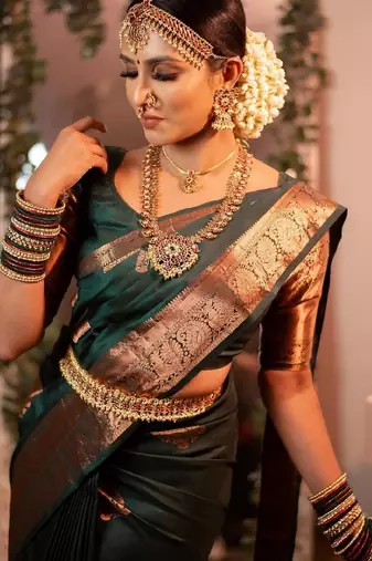 Green silk blend banarasi saree with unstitched blouse piece