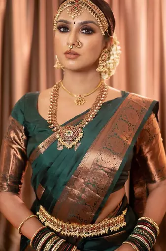 Green silk blend banarasi saree with unstitched blouse piece