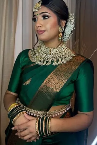 Green silk blend banarasi saree with unstitched blouse piece