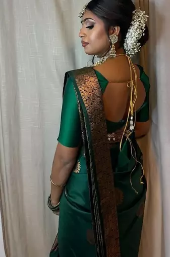 Green silk blend banarasi saree with unstitched blouse piece