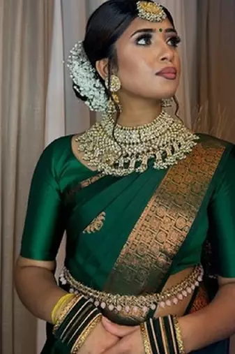 Green silk blend banarasi saree with unstitched blouse piece