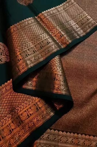 Green silk blend banarasi saree with unstitched blouse piece