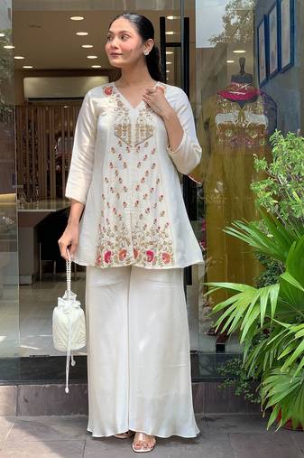 Women's silk sequin embroidered white v-neck kurta with silk sharara set