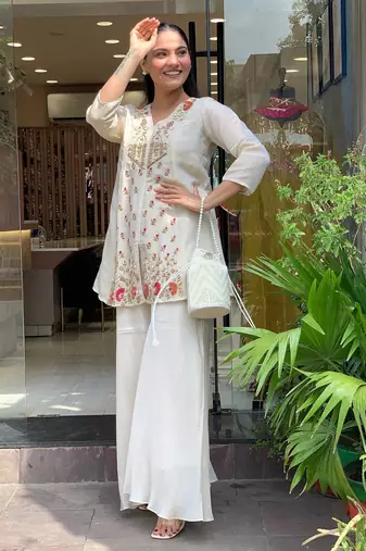 Women's silk sequin embroidered white v-neck kurta with silk sharara set