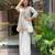 Women's silk sequin embroidered white v-neck kurta with silk sharara set