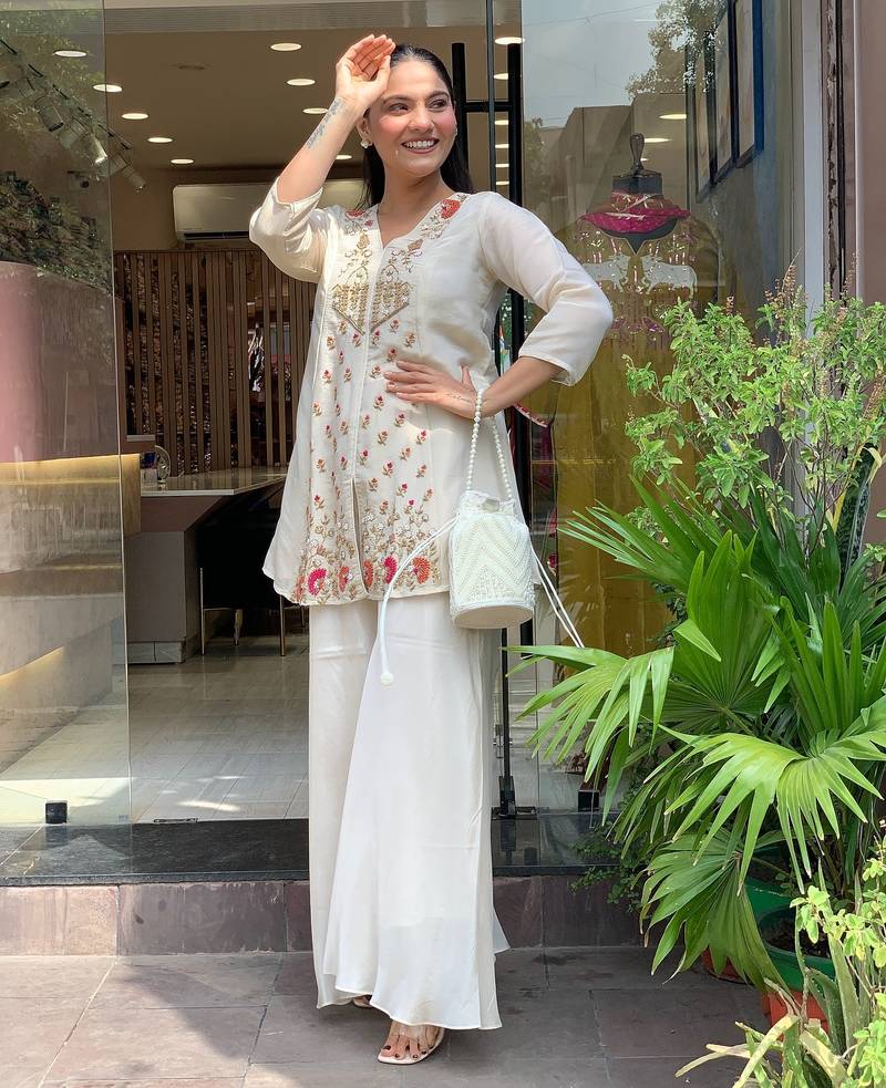 Women's silk sequin embroidered white v-neck kurta with silk sharara set