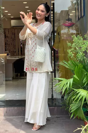 Women's silk sequin embroidered white v-neck kurta with silk sharara set