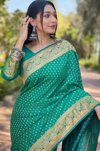 Teal silk blend banarasi saree with unstitched blouse piece