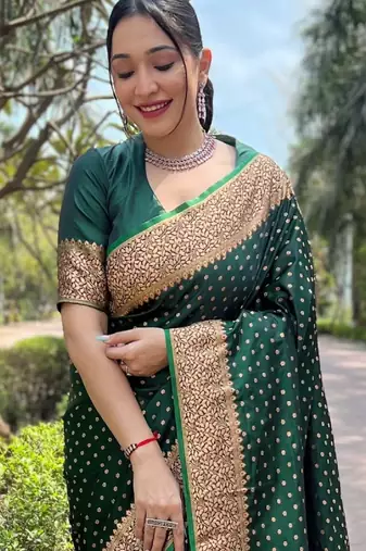 Green silk blend banarasi saree with unstitched blouse piece