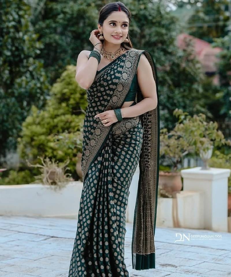 Green soft silk blend banarasi jacuard work designer party wear saree with unstitched blouse piece