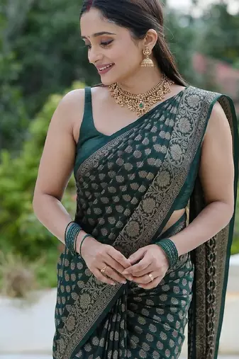 Green silk blend banarasi saree with unstitched blouse piece