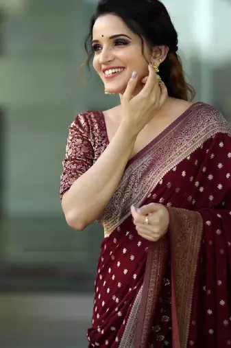 Dark green silk blend banarasi saree with unstitched blouse piece