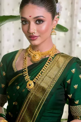 Green silk blend banarasi saree with unstitched blouse piece