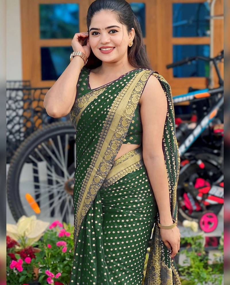 Green soft silk blend banarasi jacuard work designer party wear saree with unstitched blouse piece