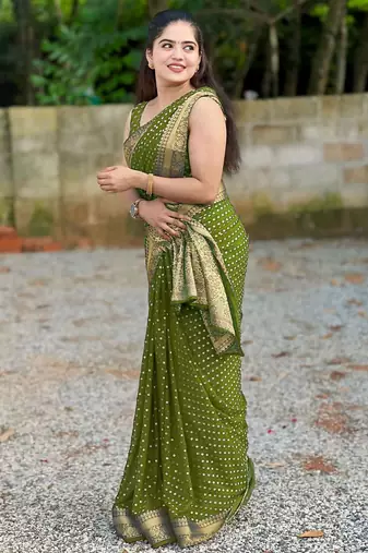 Mehendi silk blend banarasi saree with unstitched blouse piece