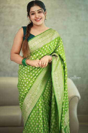 Parrot green soft silk blend banarasi jacuard work designer party wear saree with unstitched blouse piece