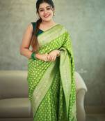 Parrot green soft silk blend banarasi jacuard work designer party wear saree with unstitched blouse piece