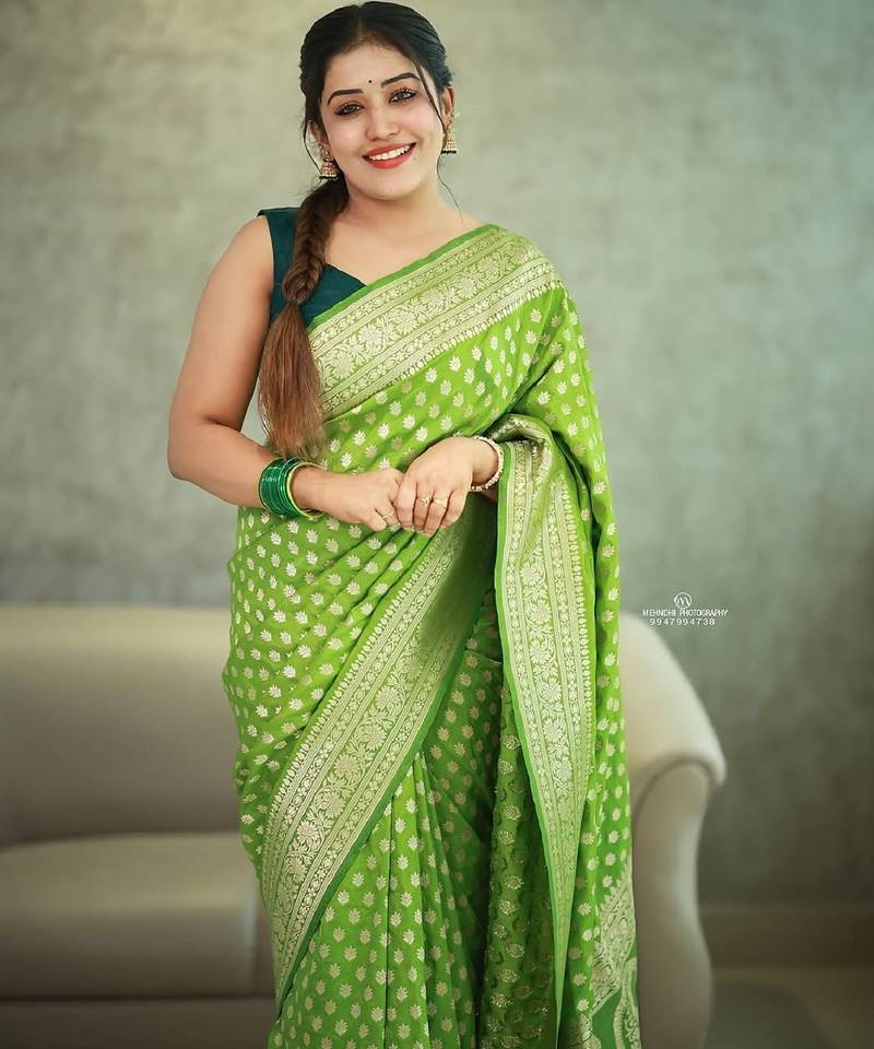 Parrot green soft silk blend banarasi jacuard work designer party wear saree with unstitched blouse piece