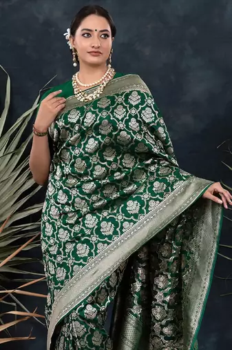 Green silk blend banarasi saree with unstitched blouse piece
