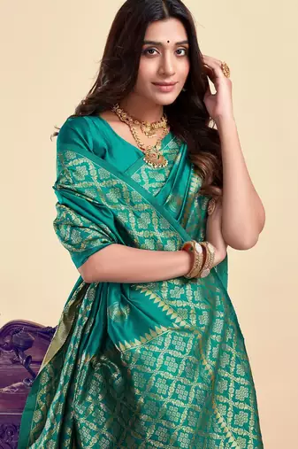Teal green silk blend banarasi saree with unstitched blouse piece