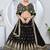 black and gold traditional lehenga choli set
