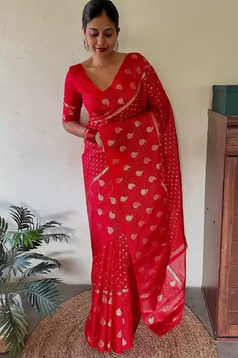 Red silk blend banarasi saree with unstitched blouse piece