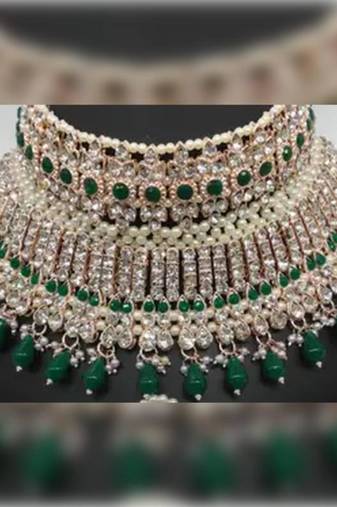 Exquisite crystal and pearl bridal choker set with matching earrings and tikka
