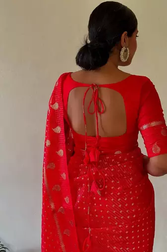Red silk blend banarasi saree with unstitched blouse piece