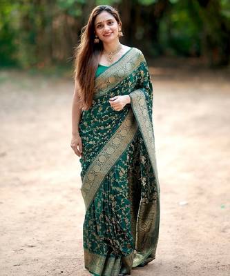 Green silk blend banarasi saree with unstitched blouse piece 1