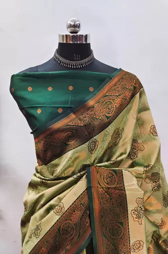 Pista green silk blend banarasi saree with unstitched blouse piece
