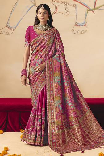 Rani pink embroidered silk blend saree