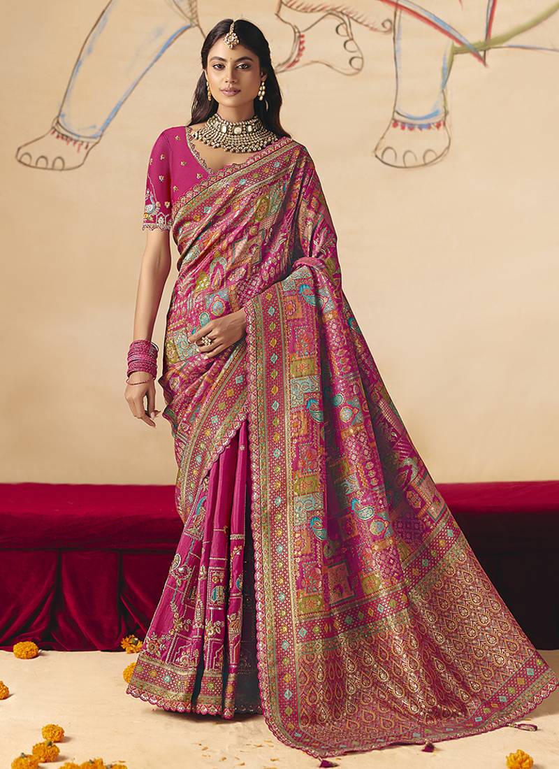 Rani pink embroidered silk blend saree