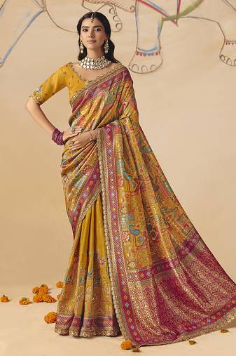 Mustard embroidered silk blend saree