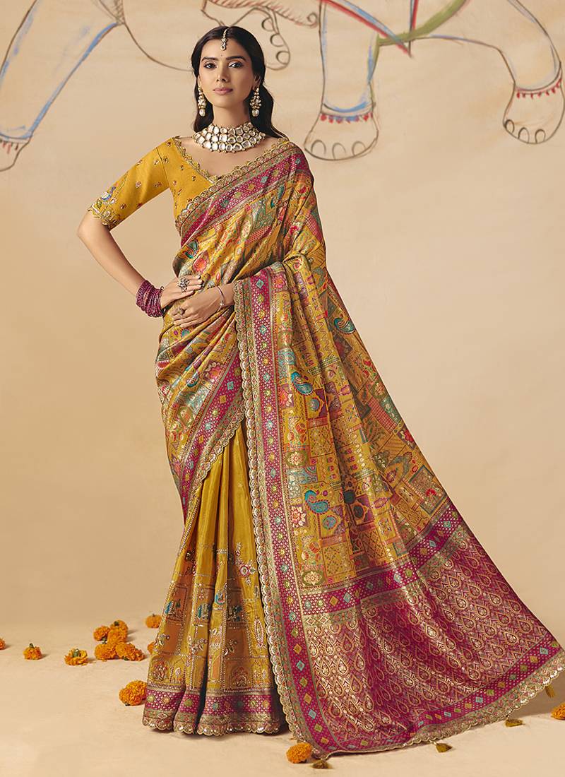 Mustard embroidered silk blend saree