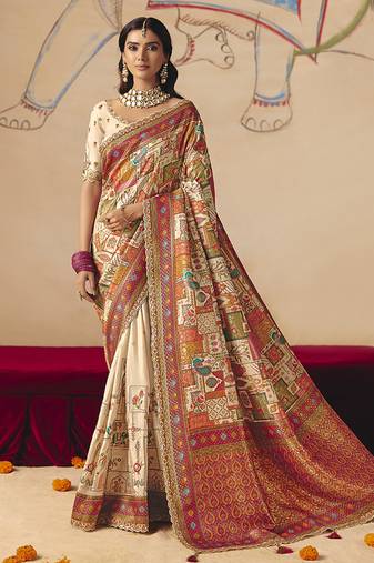 Cream embroidered silk blend saree