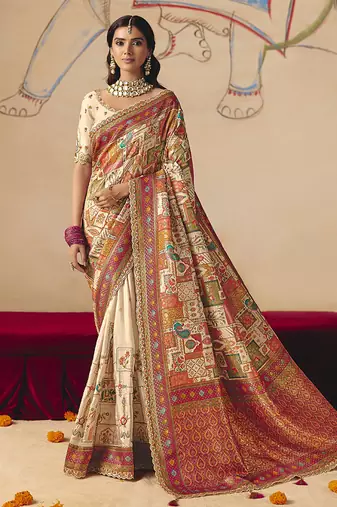 Cream embroidered silk blend saree