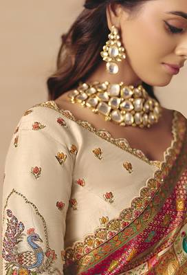 Cream embroidered silk blend saree 2