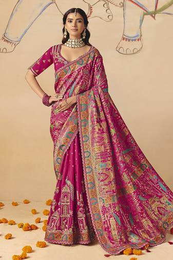 Rani pink embroidered silk blend saree