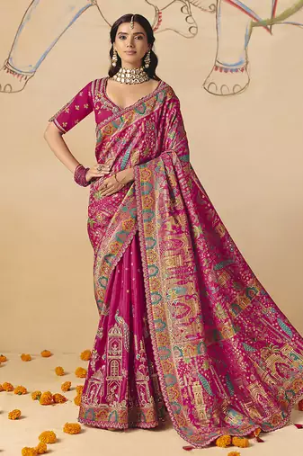 Rani pink embroidered silk blend saree