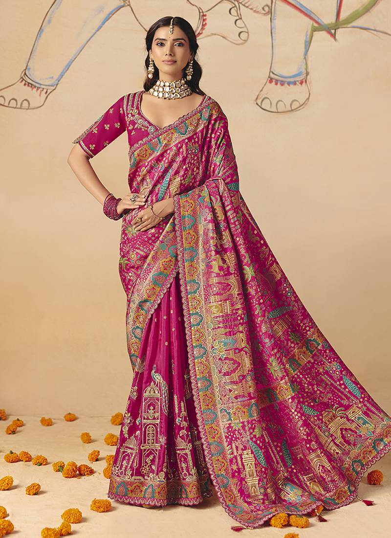 Rani pink embroidered silk blend saree