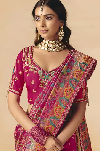 Rani pink embroidered silk blend saree