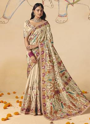 Cream embroidered silk blend saree 1