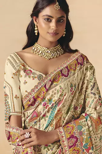 Cream embroidered silk blend saree