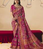 Rani pink embroidered silk blend saree