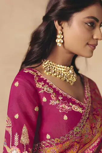Rani pink embroidered silk blend saree
