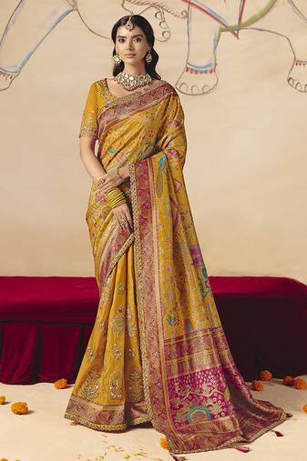 Mustard embroidered silk blend saree