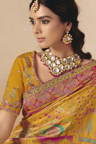 Mustard embroidered silk blend saree
