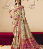 Cream embroidered silk blend saree